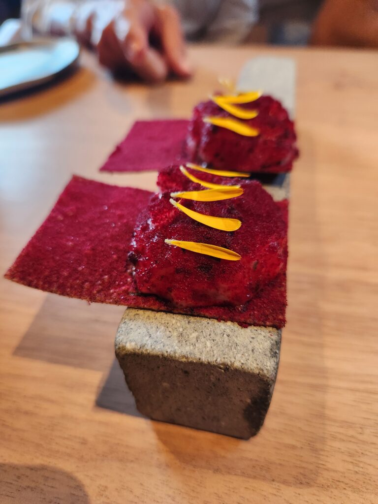 Amaranthus chip topped with fish tartare